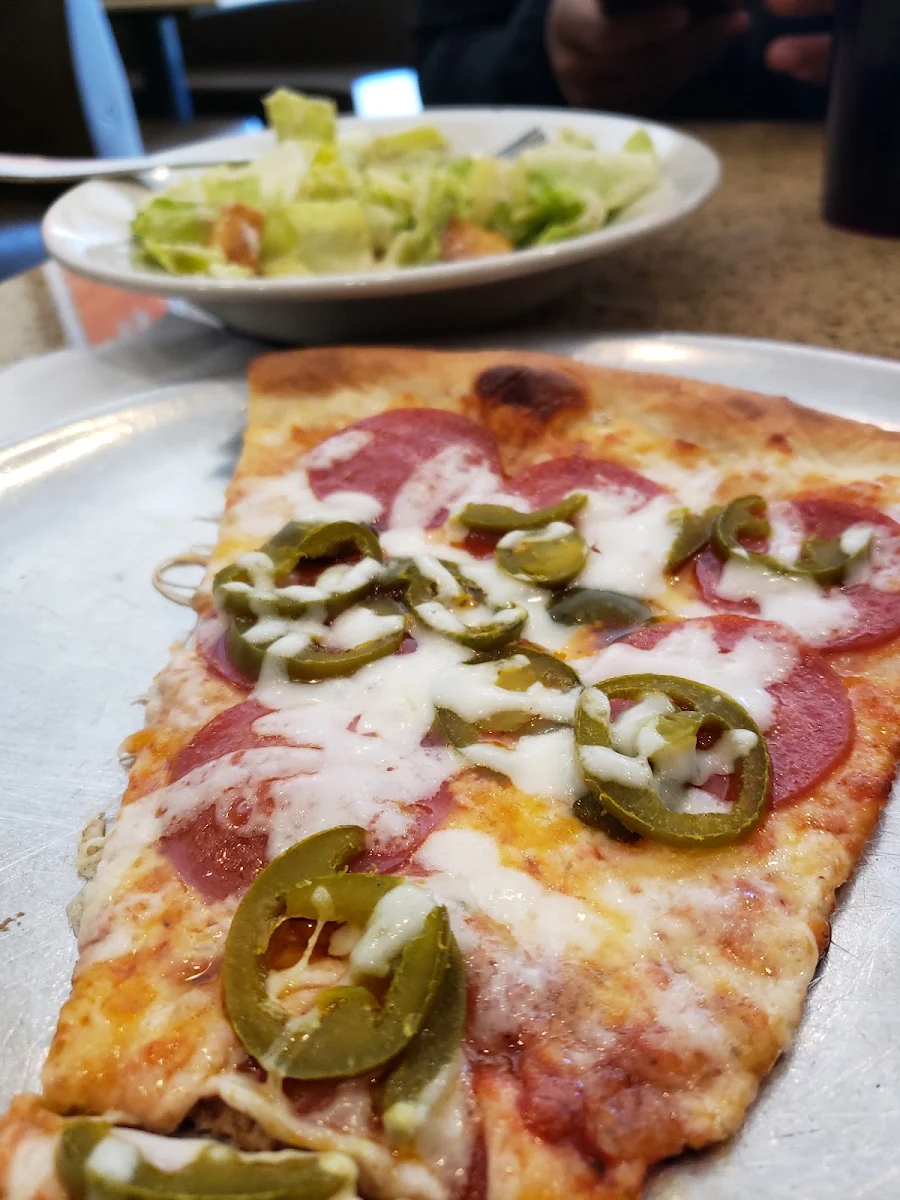 Pepperoni and Jalapeño Peppers Pizza Slice