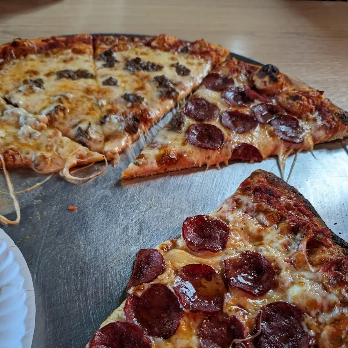Pepperoni Pizza and Beef Sausage Pizza