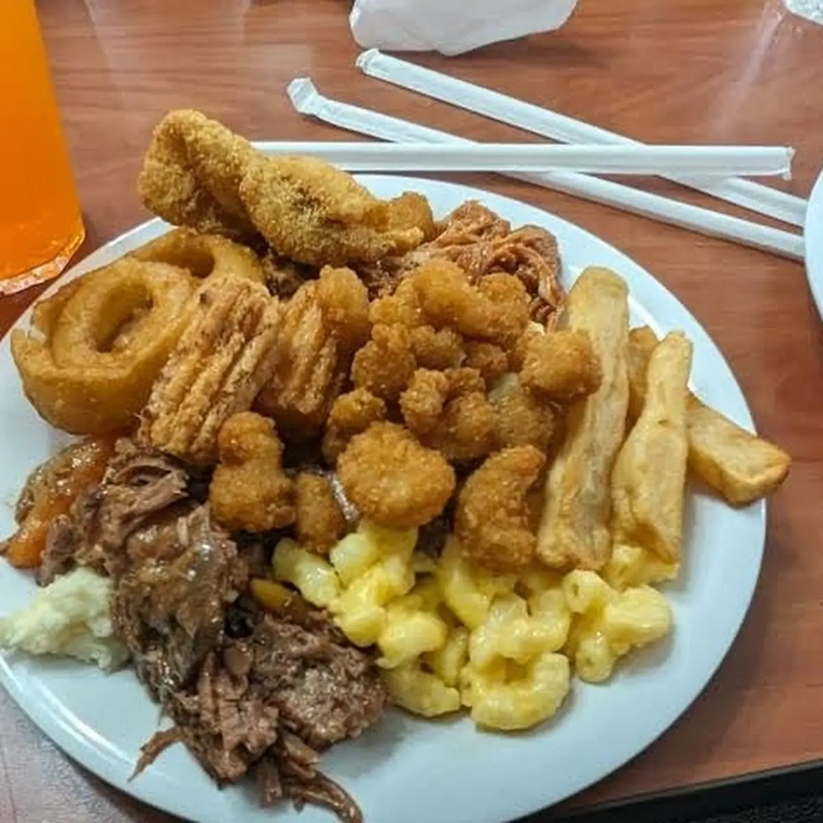 Mac and Cheese Breaded Fish Fried Chicken Beef and Everything Mixed Together