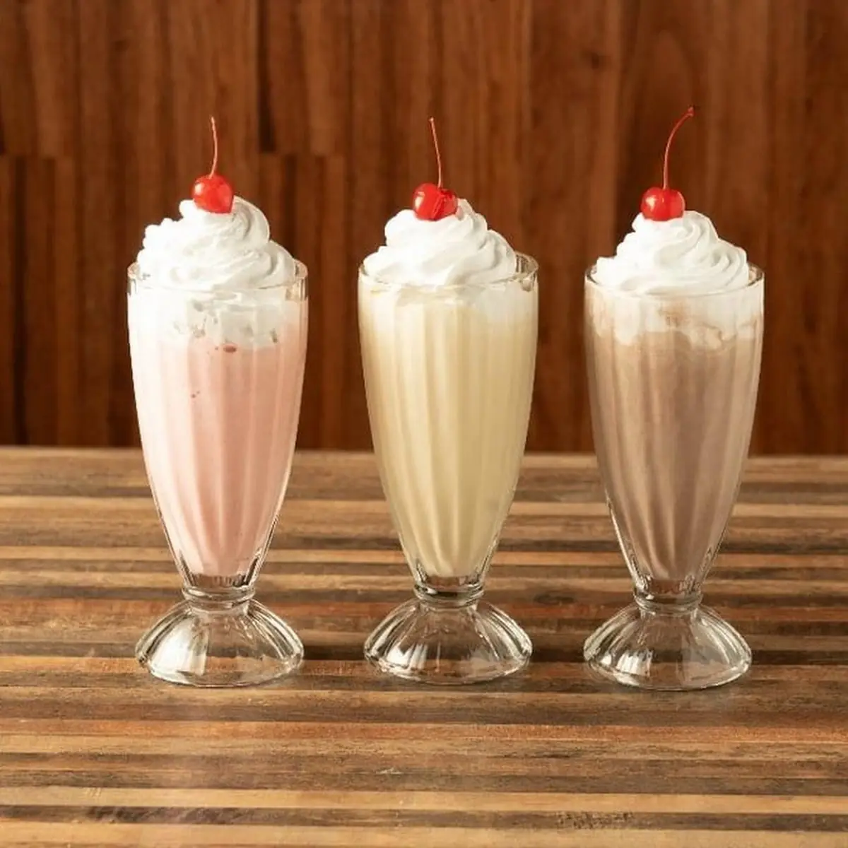 Strawberry Milkshake with Whipped Cream and Cherry