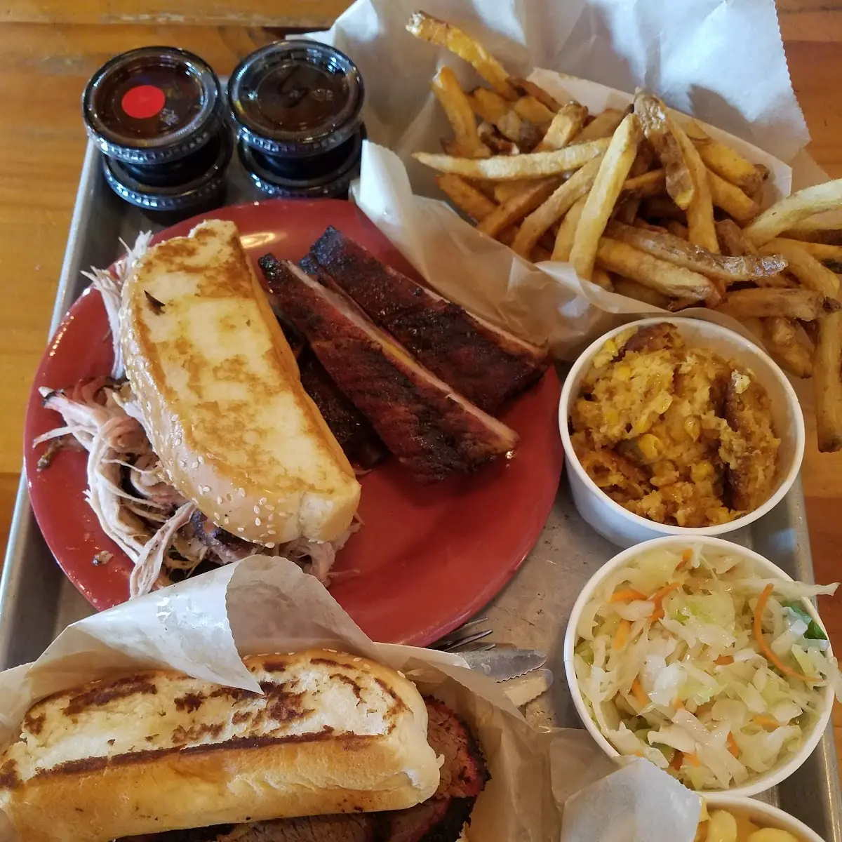 Beef Brisket Pulled Pork Ribs Corn Casserole Slaw Fresh Cut Fries with Texas Toast