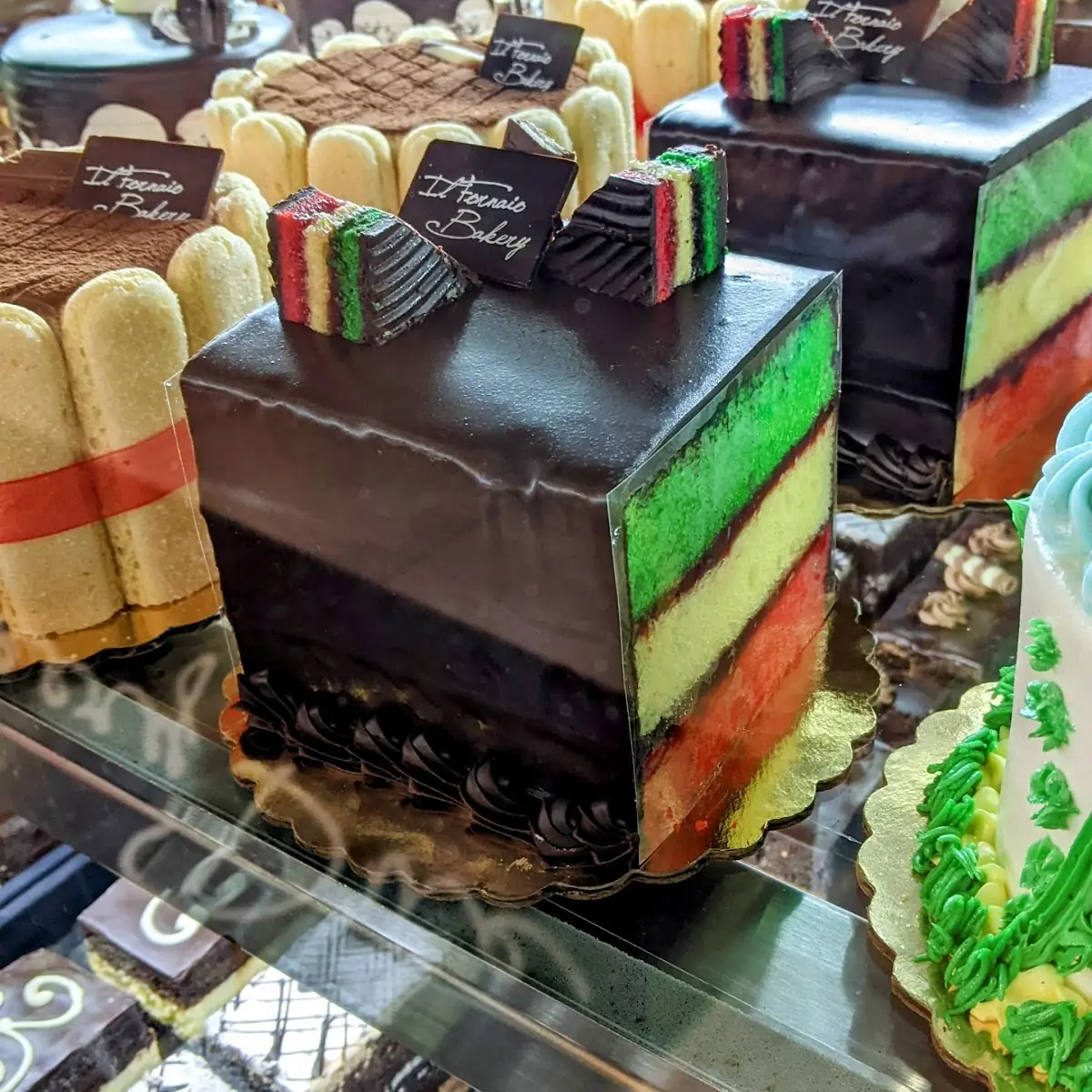 Rainbow Cookie Cake Slice