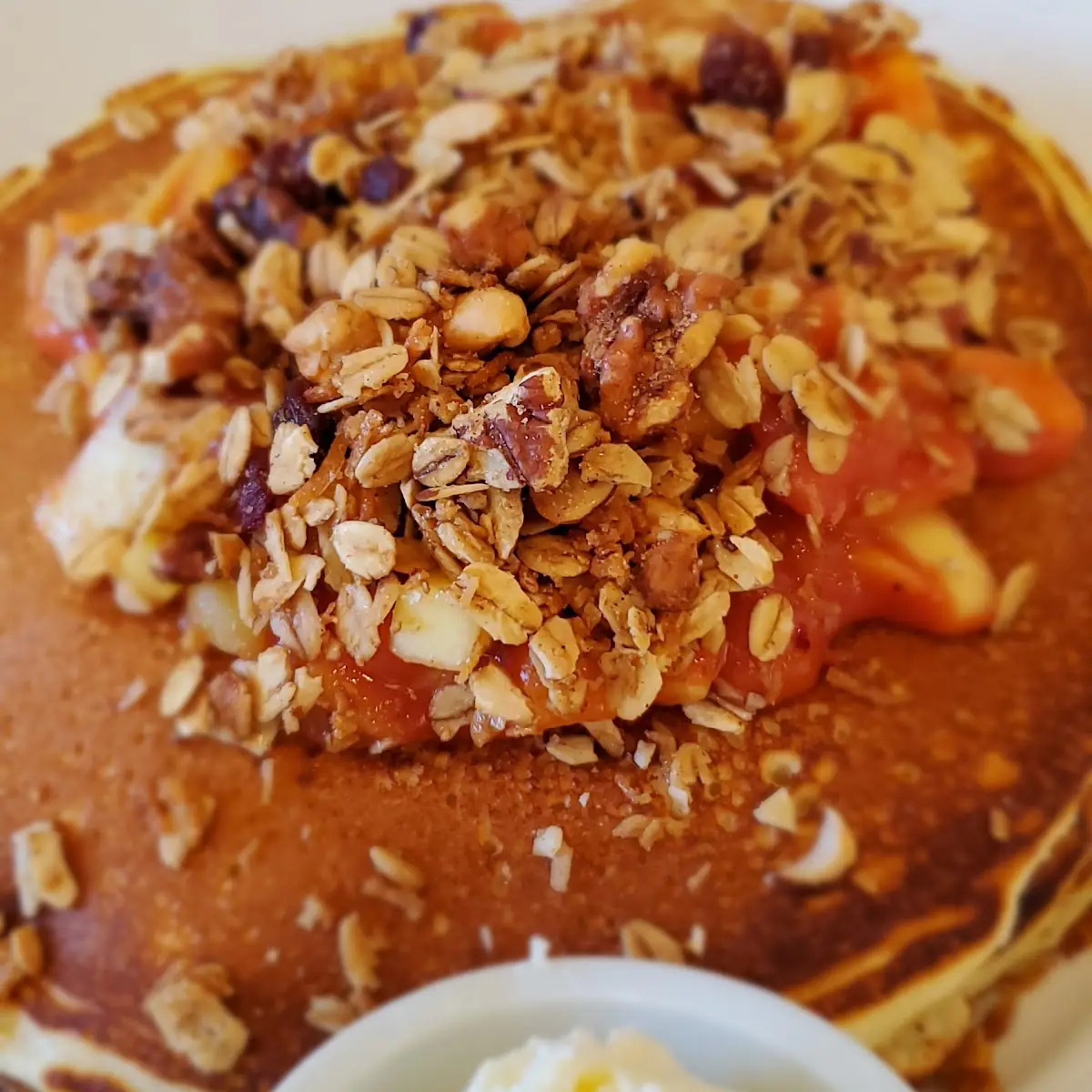 Mango Pancakes with House-Made Granola & Guava Syrup
