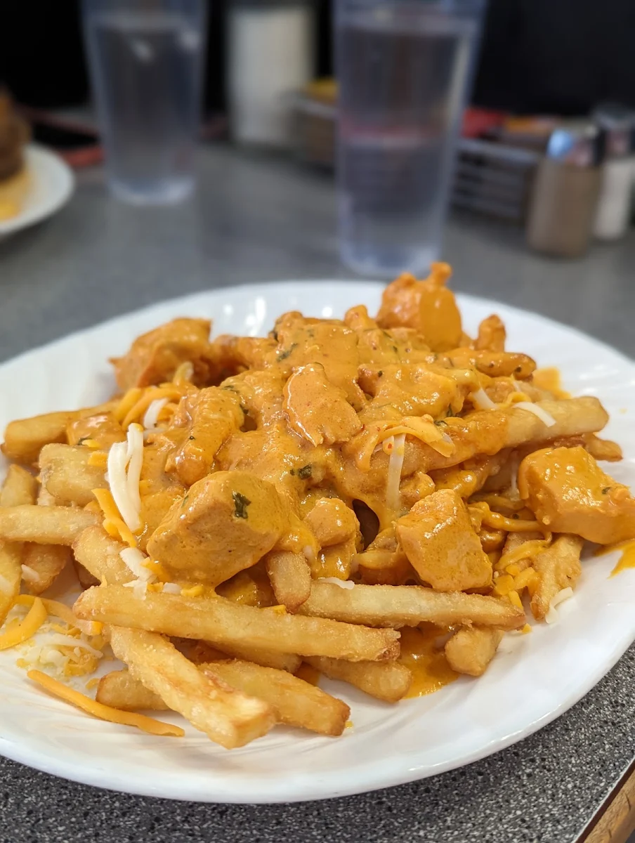 Butter Chicken Poutine, Hide-A-Way Cafe
