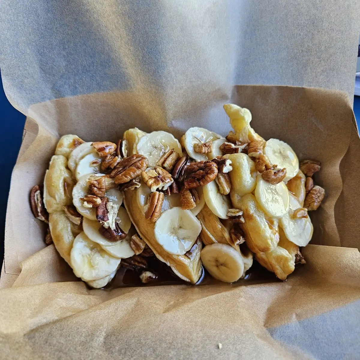 Banana Waffle with Pecans and Real Maple Syrup