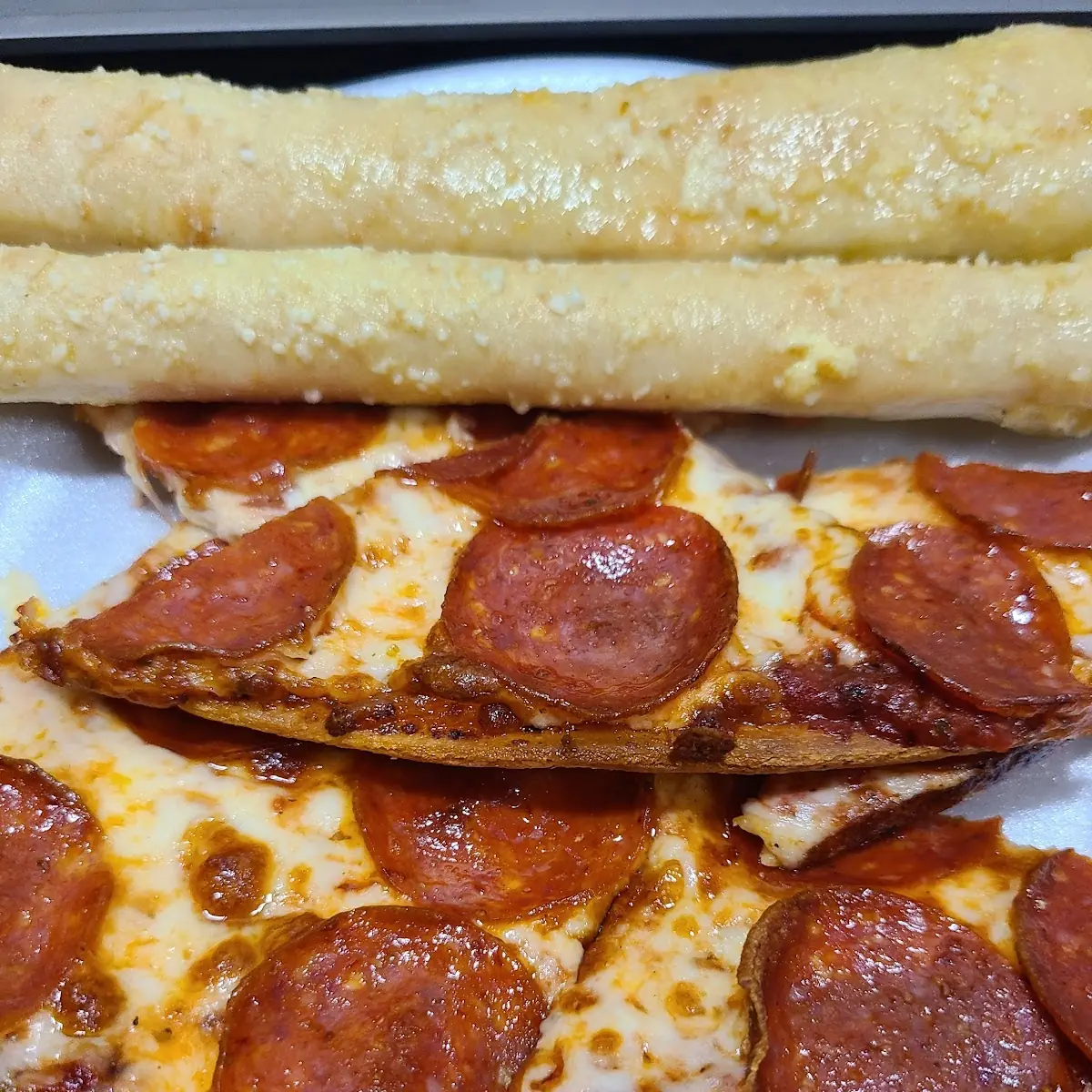 Thin Crust Pepperoni Pizza and Crazy Bread Sticks