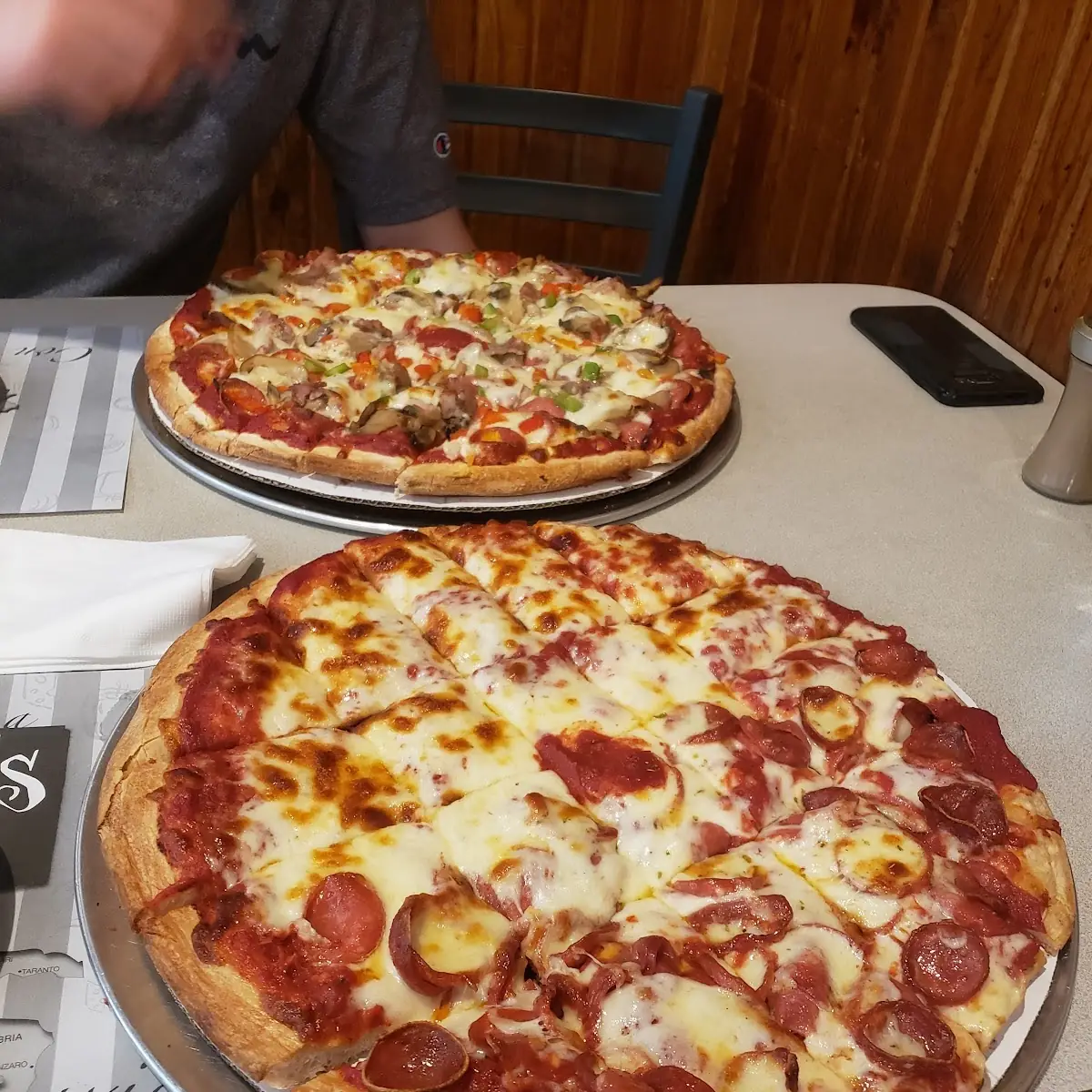 Everything Supreme Pizza and a Custom Pizza