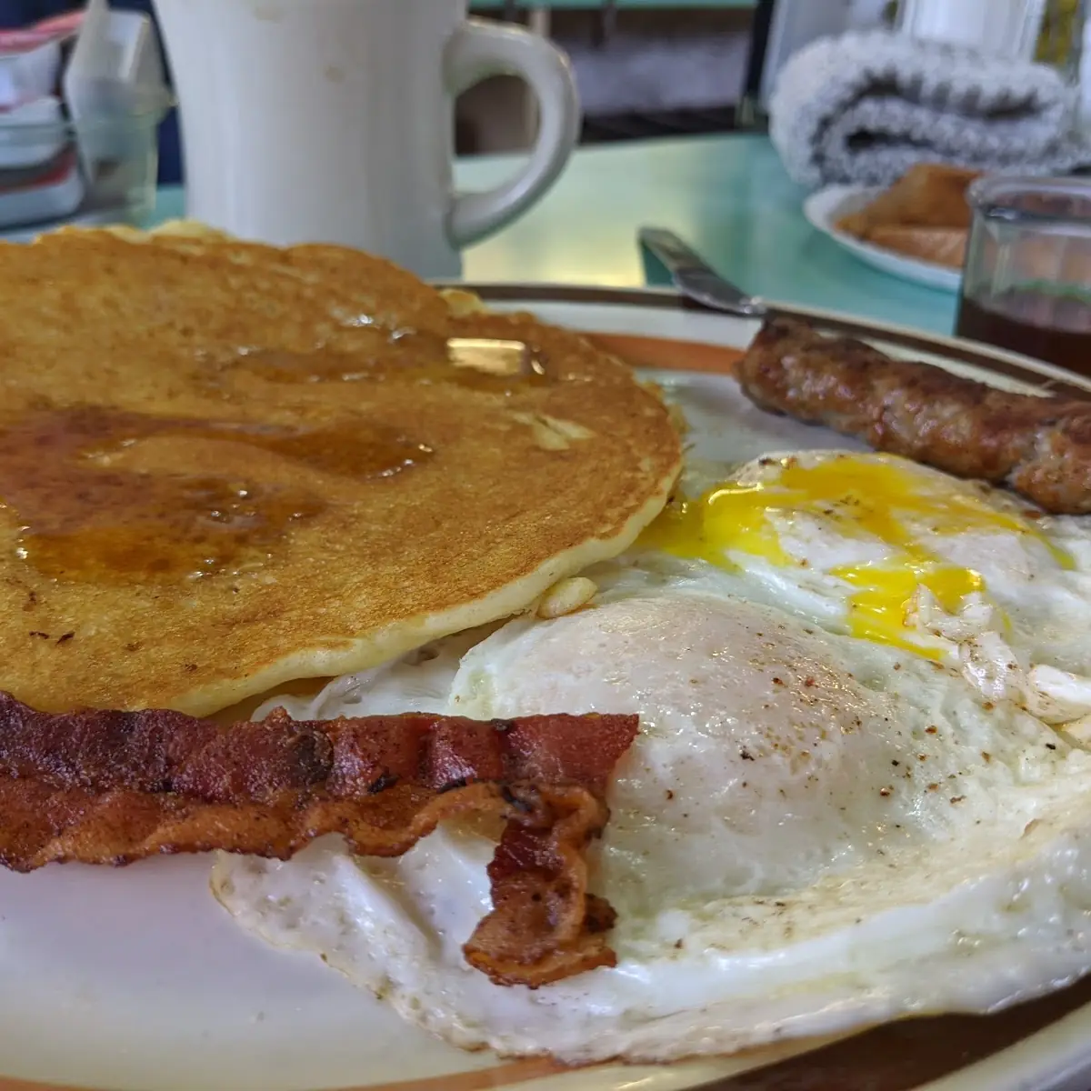 Pancakes Eggs Bacon and Sausage