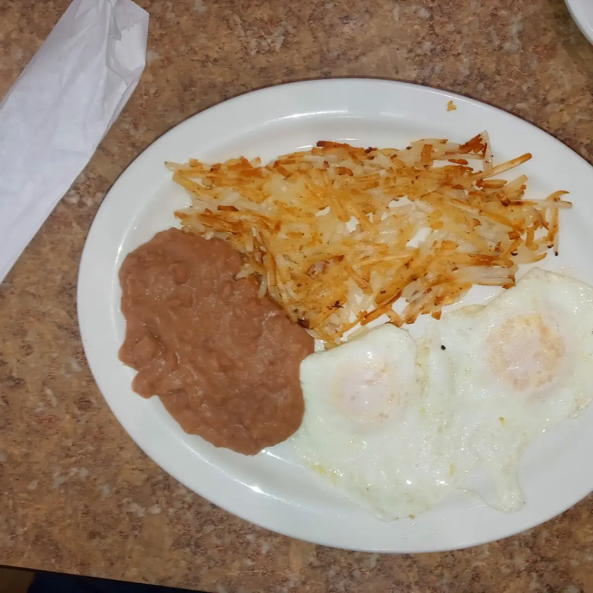 Sunny Side Eggs a Hash Browns