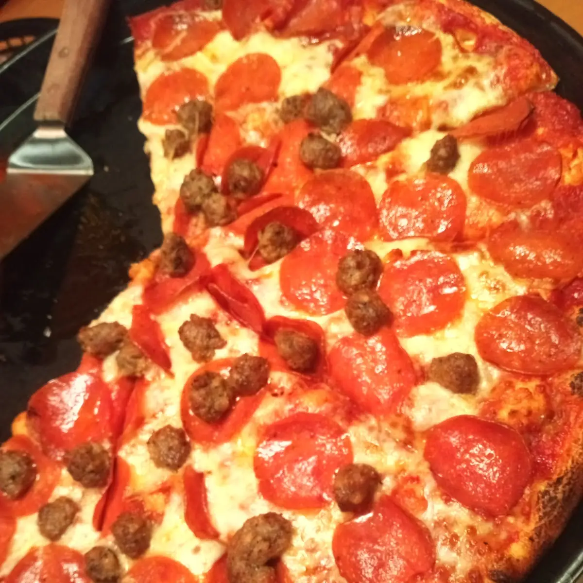 Thin Crust Pepperoni and Sausage Pizza