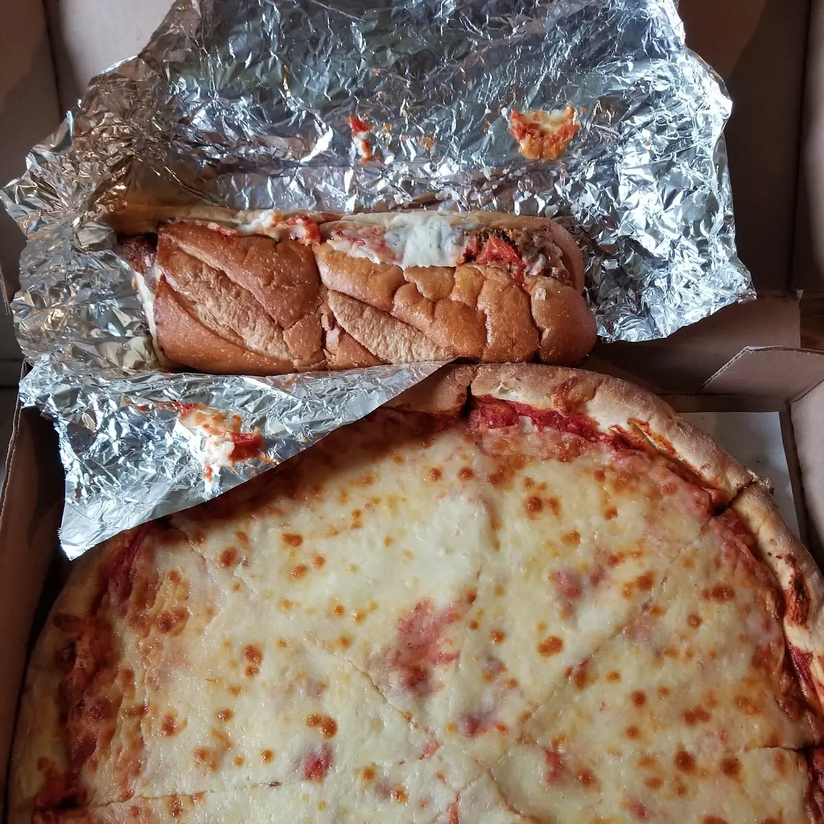 Large Extra Cheese and Chicken Parm Sandwich