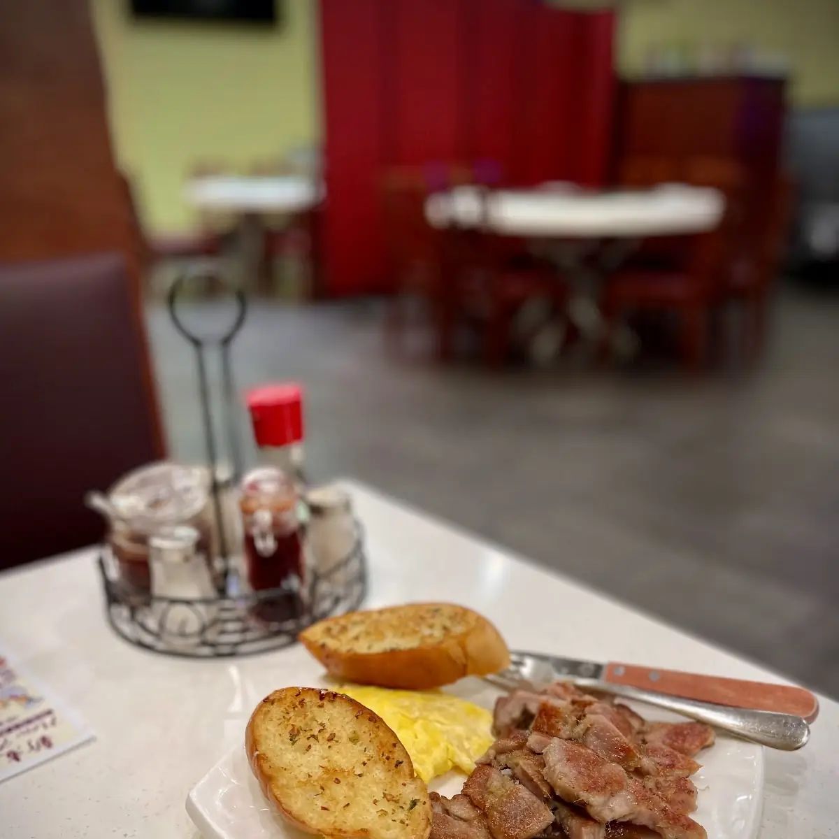 Pork Chop with Egg and Garlic Bread