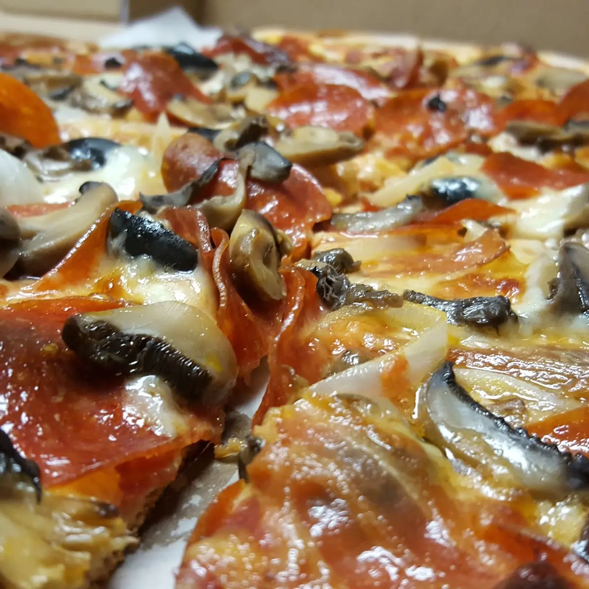 Medium Pepperoni Bacon Onion Olive