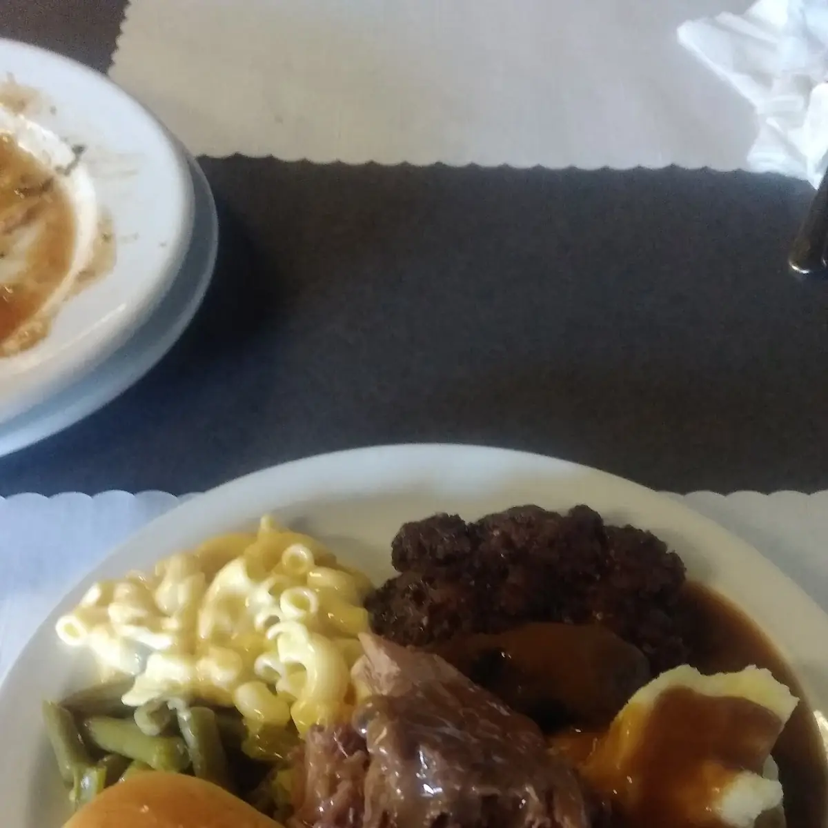 Roast Beef Mashed Potatoes and Gravy Green Beans Macaroni Cheese Roll