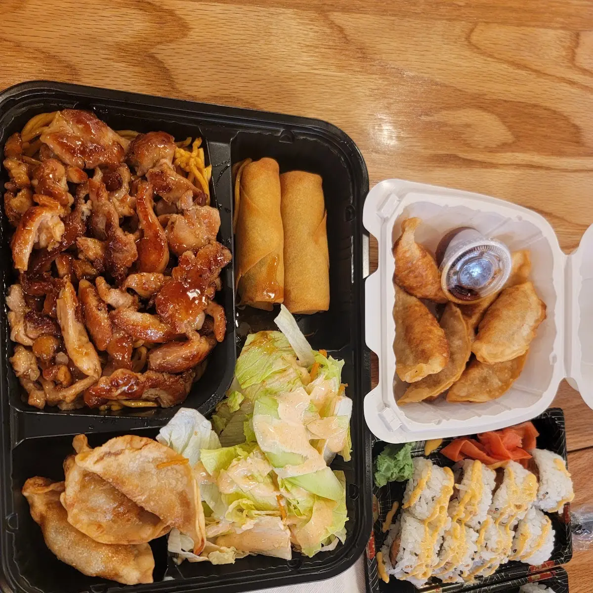 Chicken Bento Box Spicy Salmon Roll & Chicken Dumplings