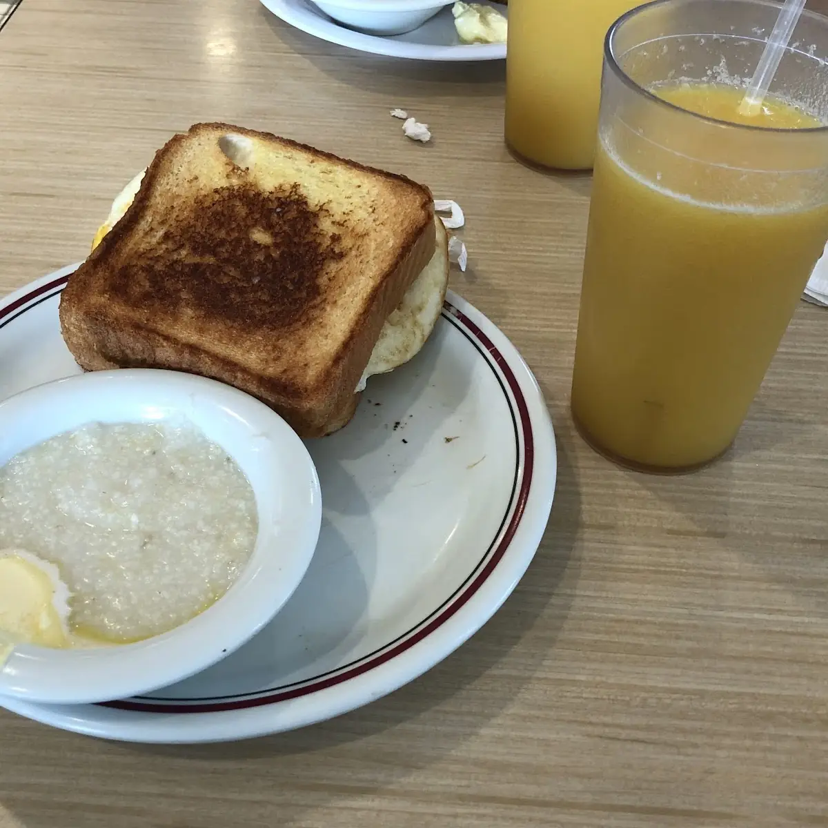 Bacon Egg and Cheese Biscuit with Grits