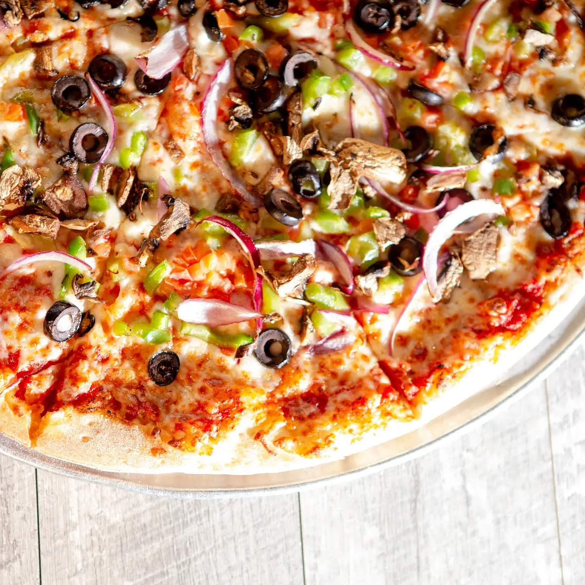 Deep Dish Pizza with Various Toppings