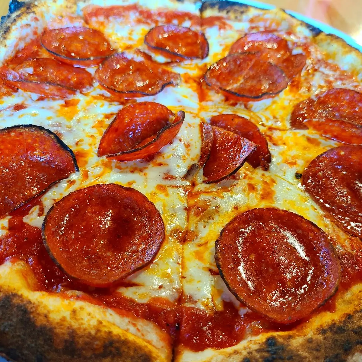 Pepperoni Pizza with WI Mozzarella and Pepperoni Comes with House-Made Tomato Sauce