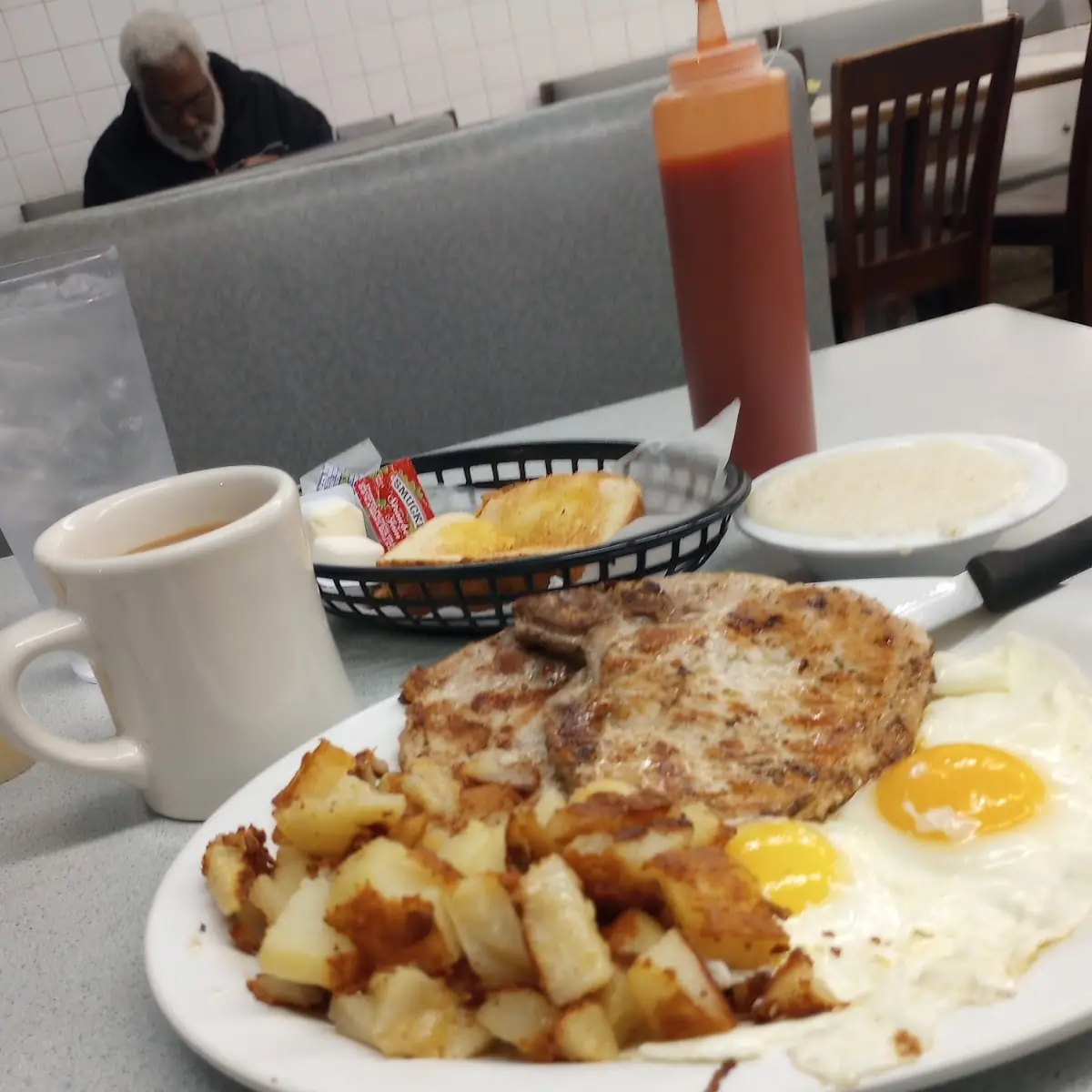 Two Eggs Two Pork Chops Hashbrowns Coffee and Toast