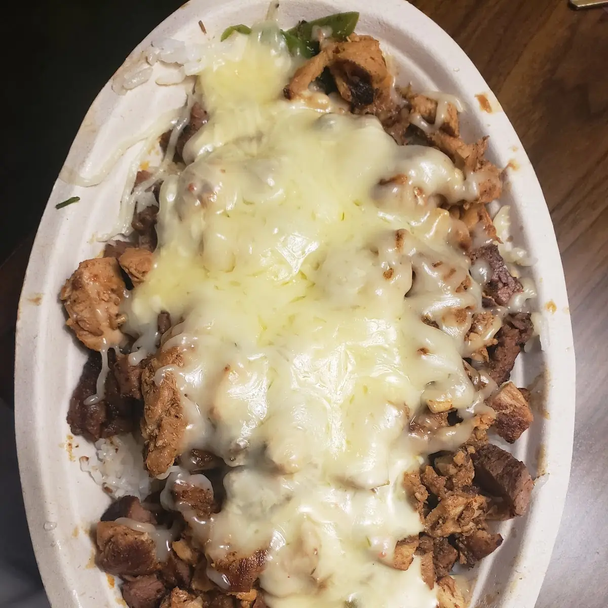 Rice Bowl White Rice Brownbeans Steak Extra Meat Chicken Extra Queso Cheese