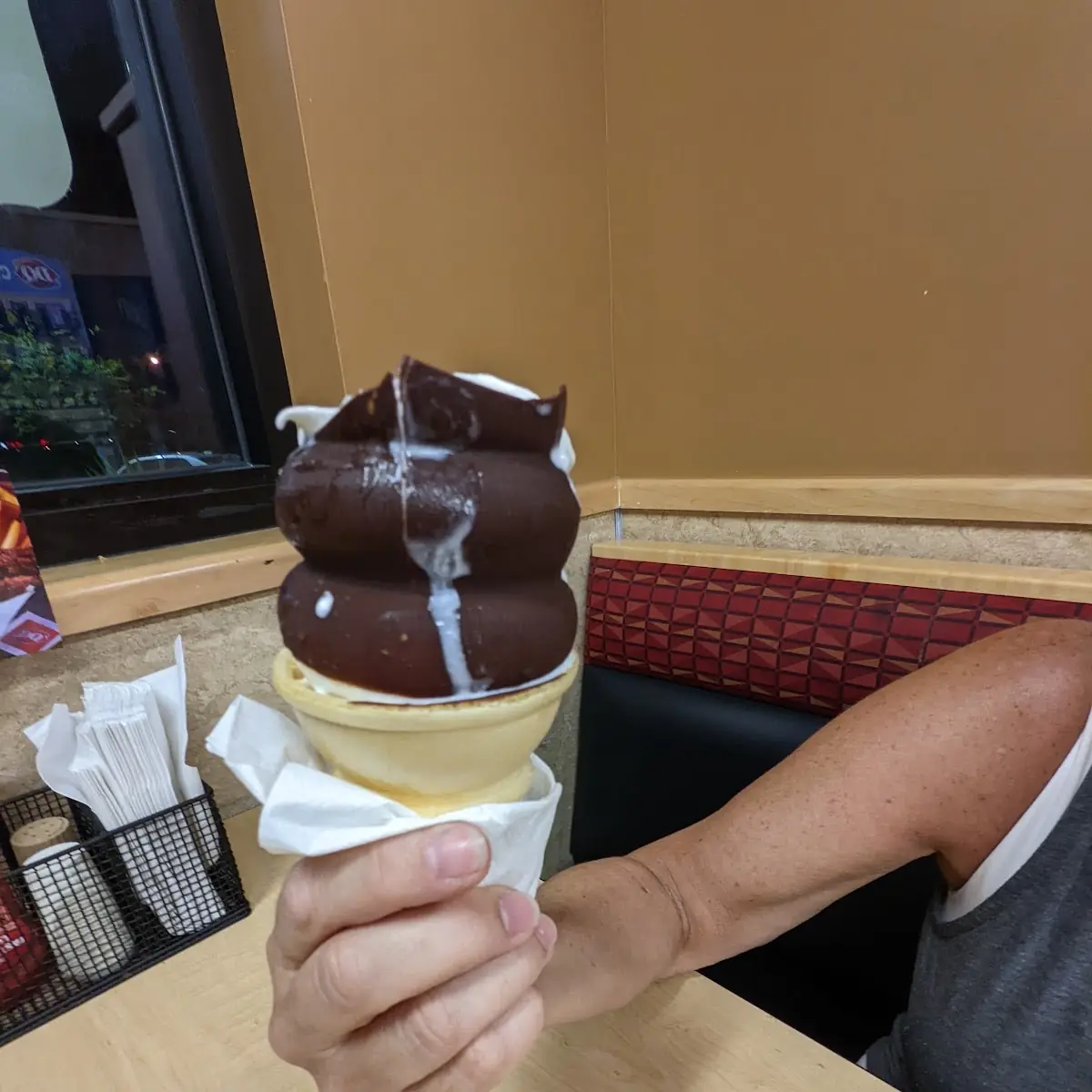 Vanilla Soft Serve Dipped in Chocolate on a Cone