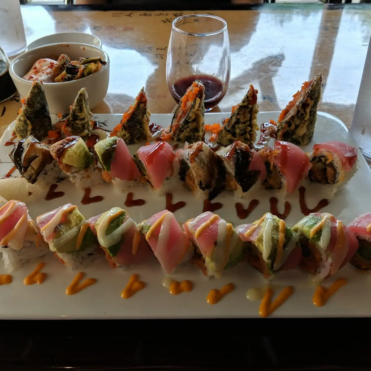 Assorted Sushi Rolls and Kimchi