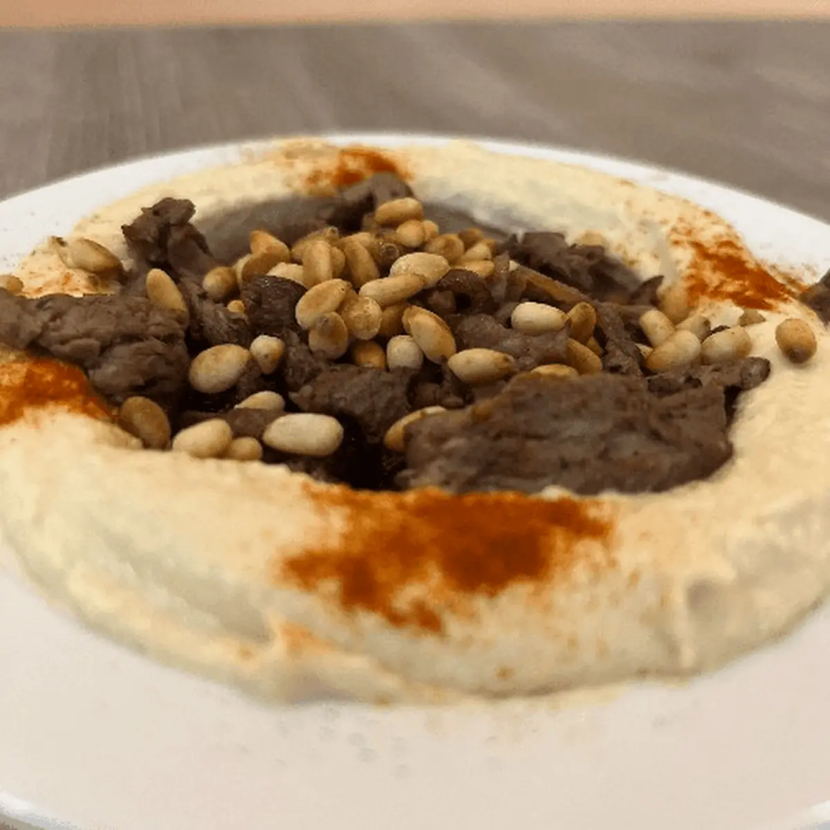 Hummus with Meat and Pine Nuts