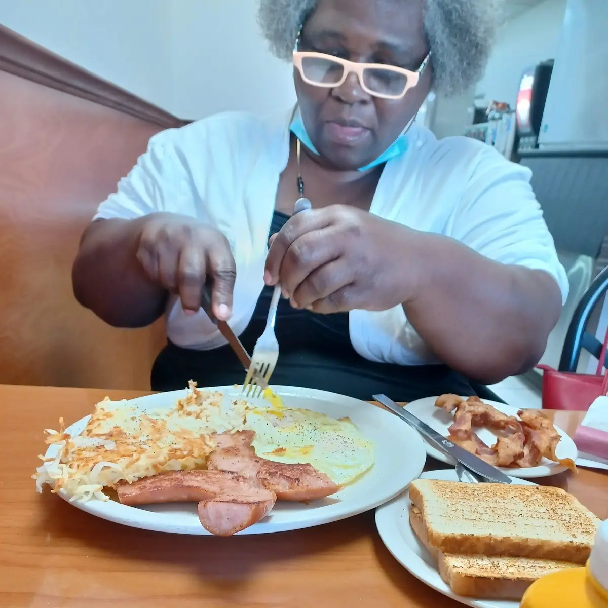 Breakfast Smoked Sausage Hash Browns over Easy Eggs Toast nd Side of Bacon or Sausage