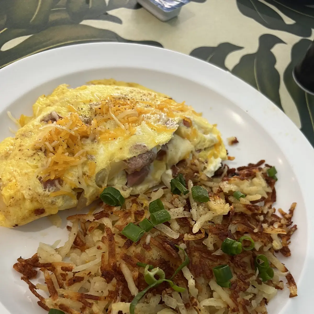 Meat Lovers Omelette with Crispy Hash Browns