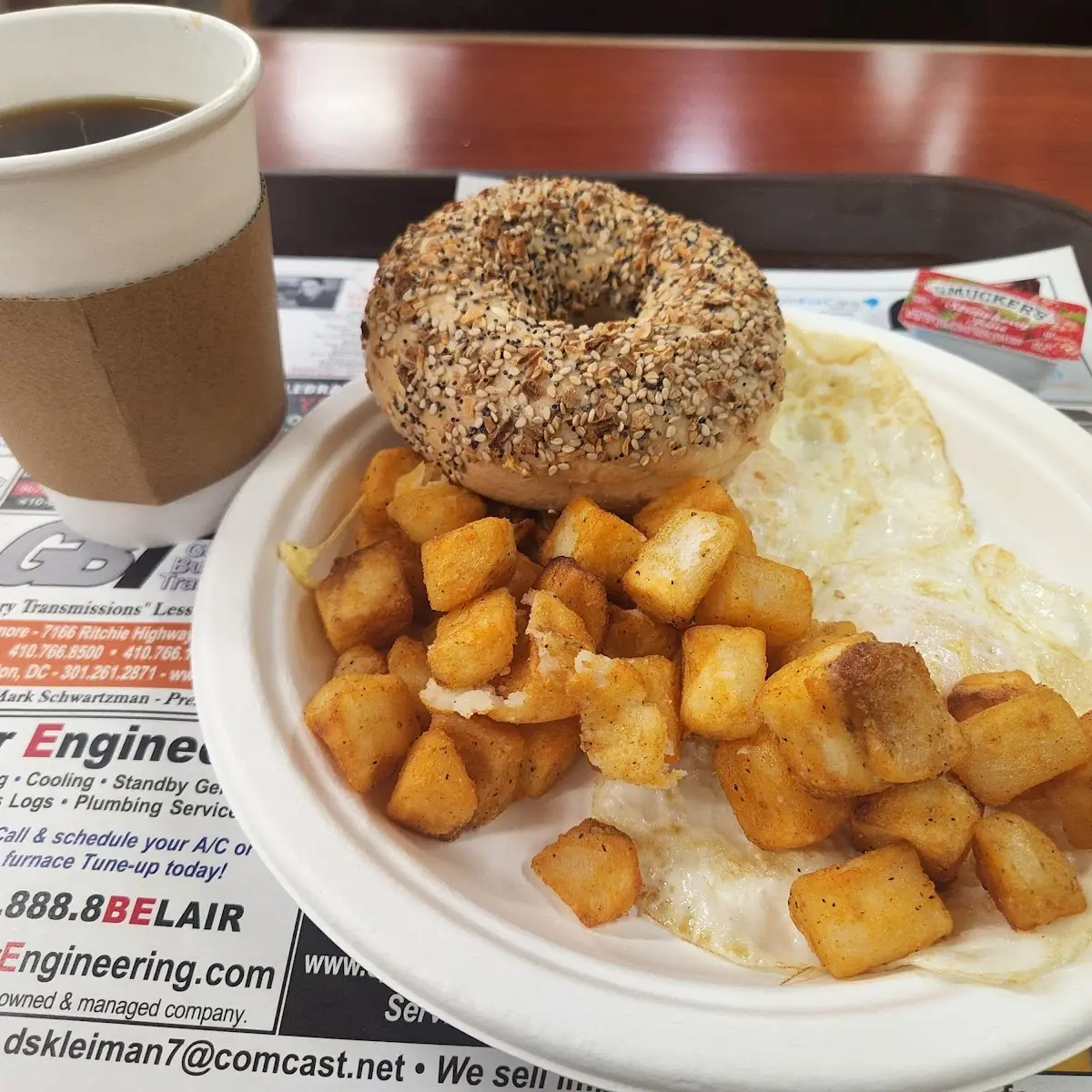 Breakfast Special 2 Eggs over Easy with Hash Browns and an Everything Bagel
