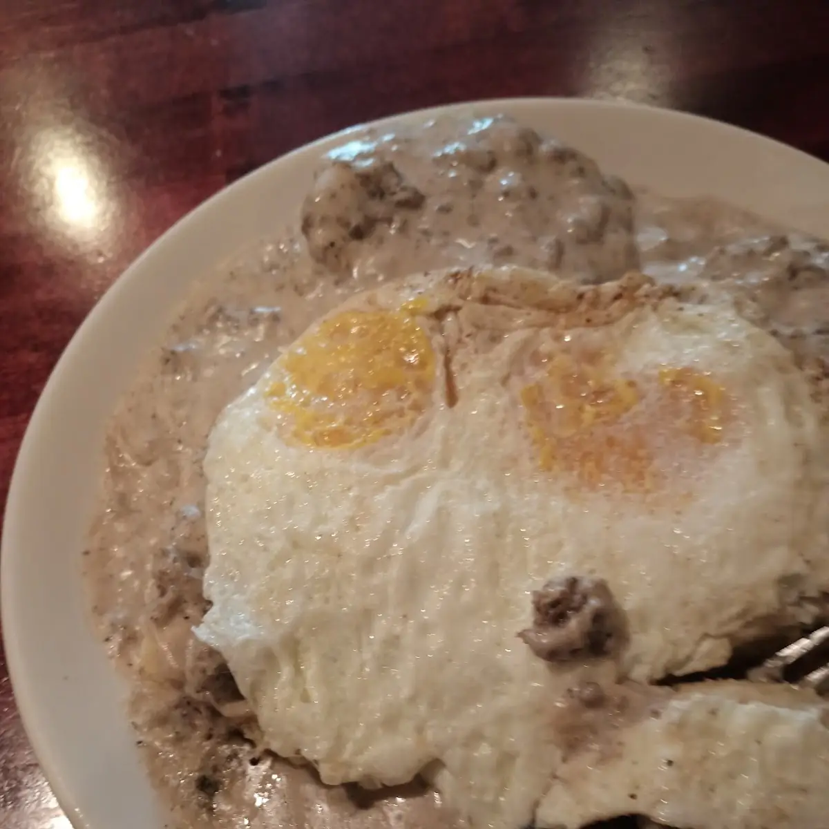 Biscuits and Gravy 2 over Easy Eggs on Top