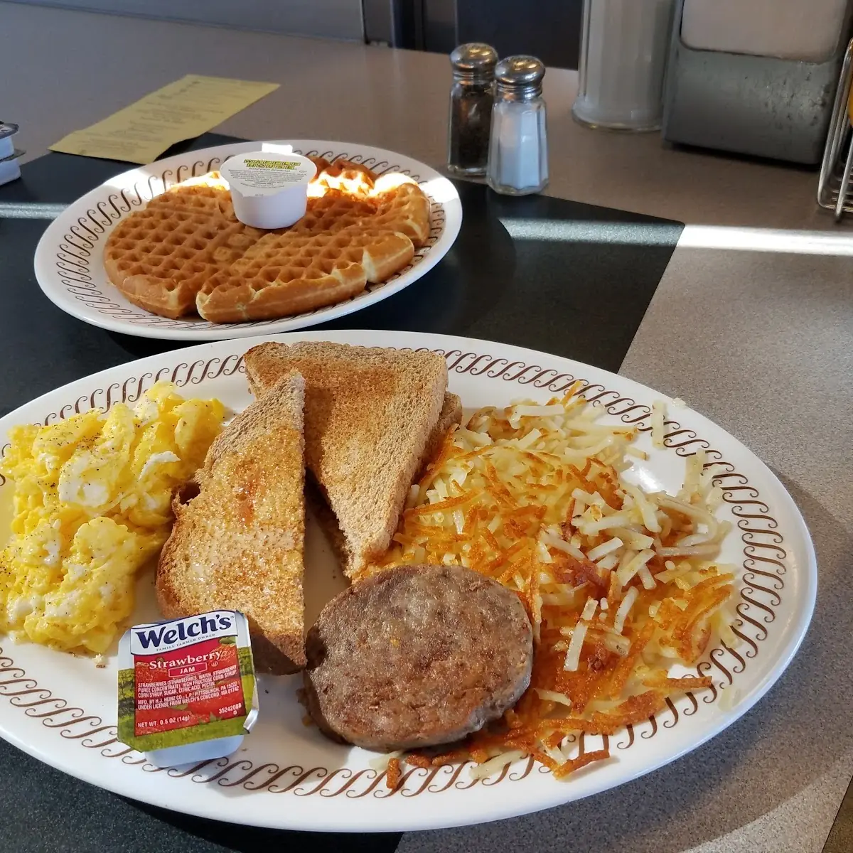 Blueberry Waffles with Scrambled Eggs Toast and Hash Browns