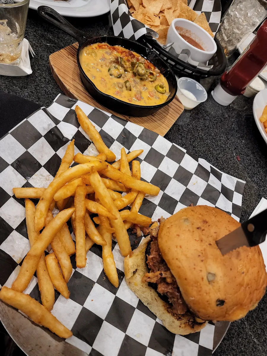 Million Dollar Burger Next to Ultimate Queso