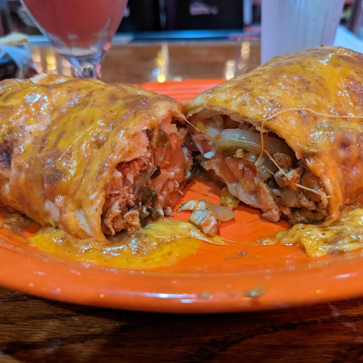 Burrito Topped with Enchilada Sauce