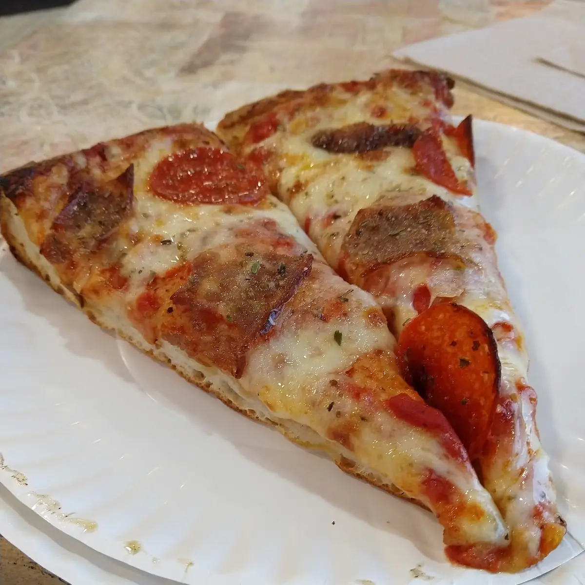 Sausage and Pepperoni Round Sicilian Slice