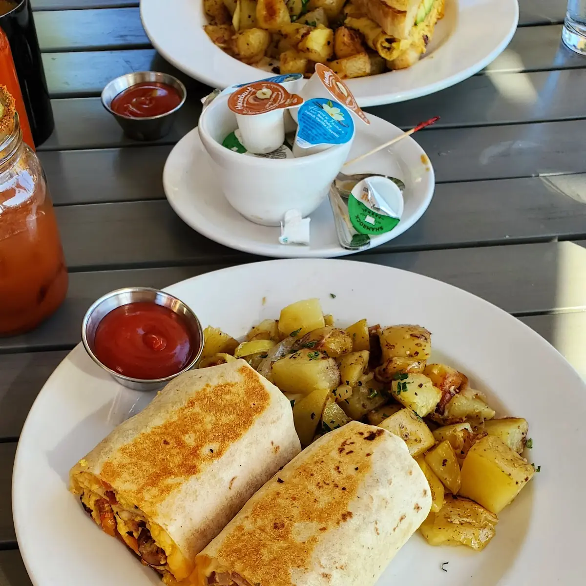 Breakfast Burrito with Ham Bacon and Peppers with Home Fried Potatoes