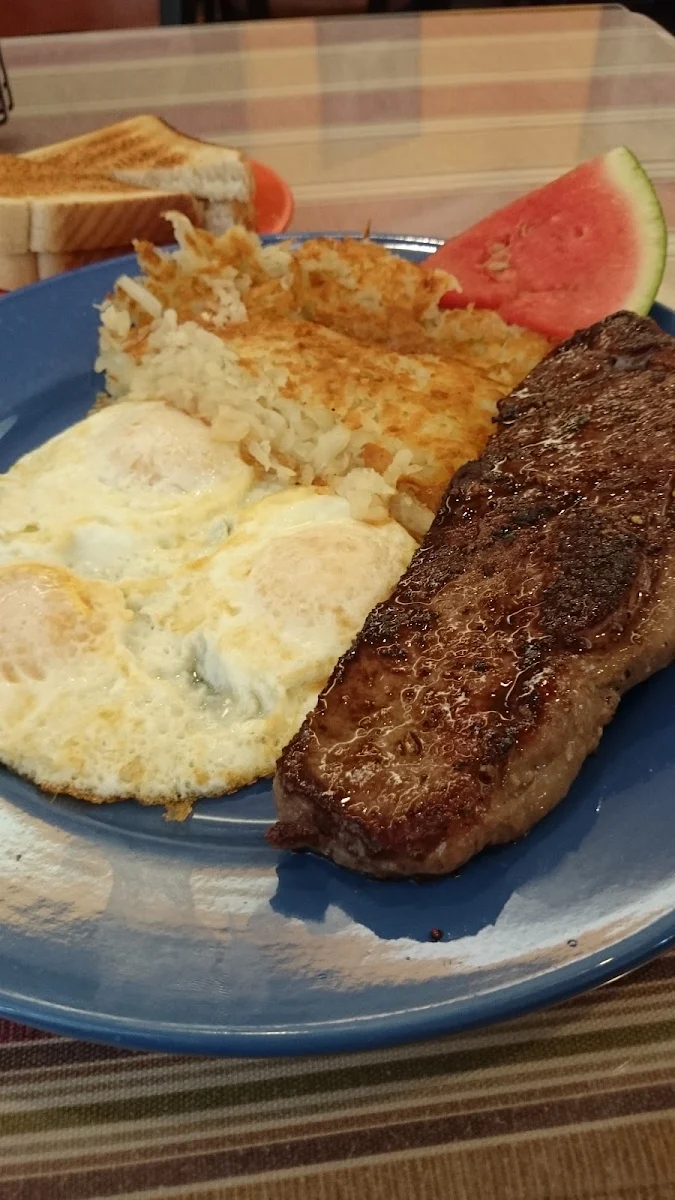 3 eggs with 8” of New York strip steak served with choice of homemade hash browns or chopped home fries, toast and jelly.