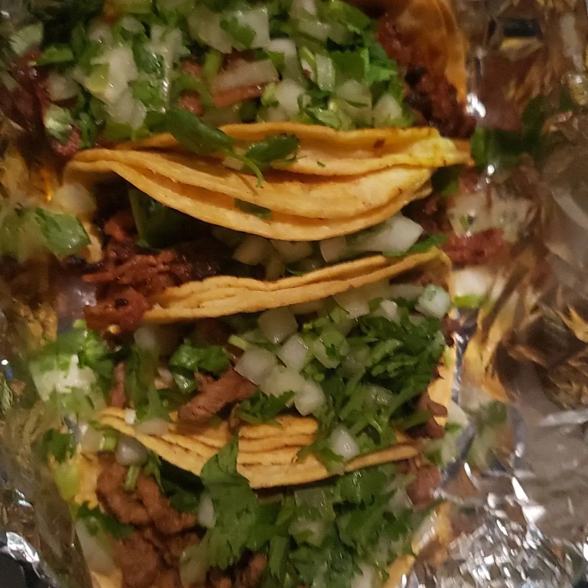 Corn Shell Tacos with Meat and Onions