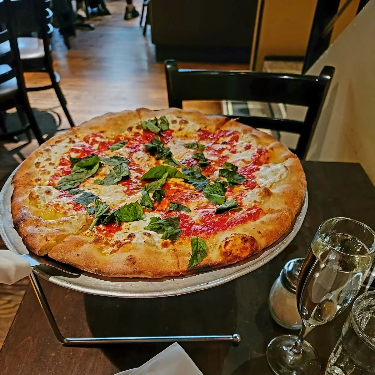 Pepperoni Pizza with Basil Leaves