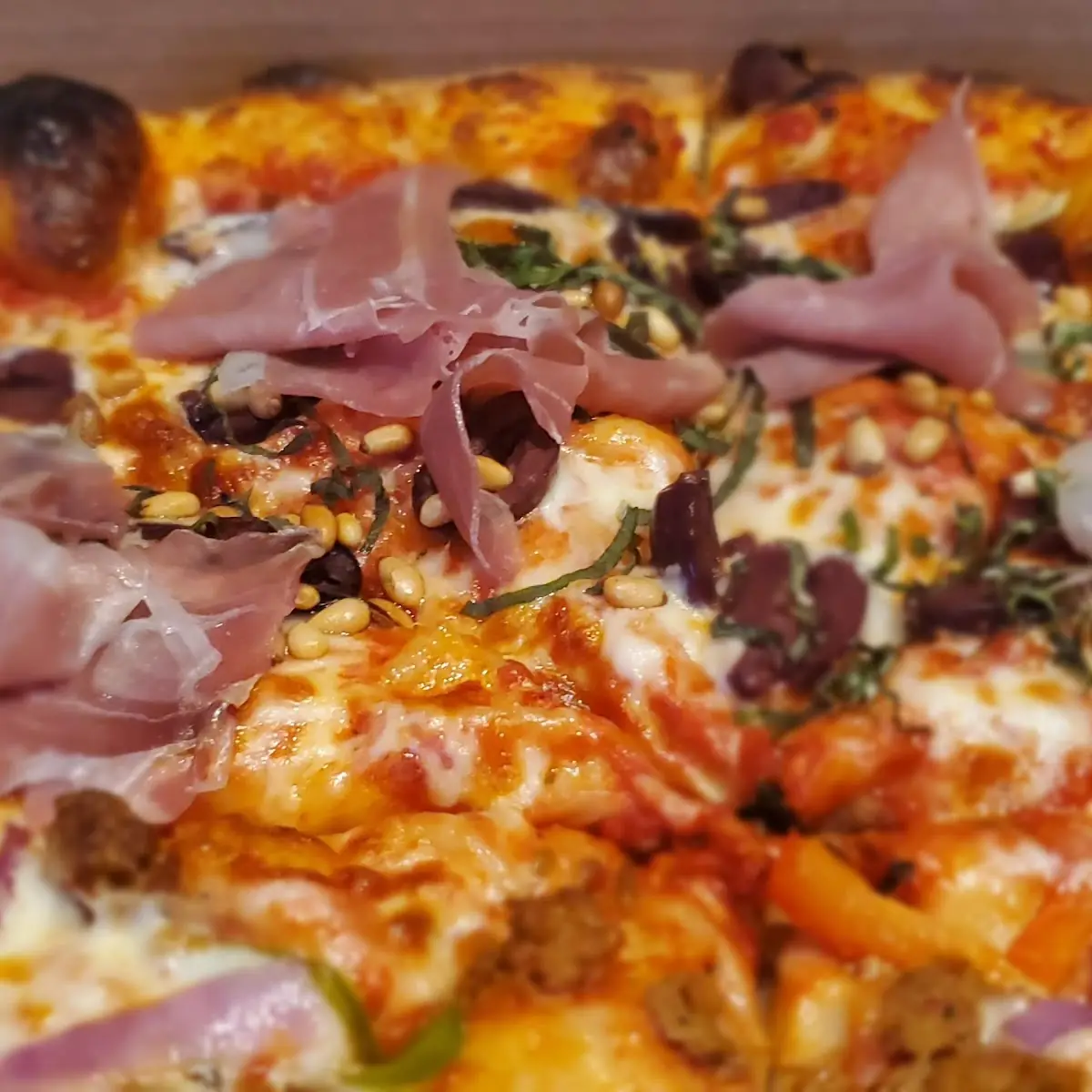Prosciutto Kalamata Olives and Toasted Pine Nuts