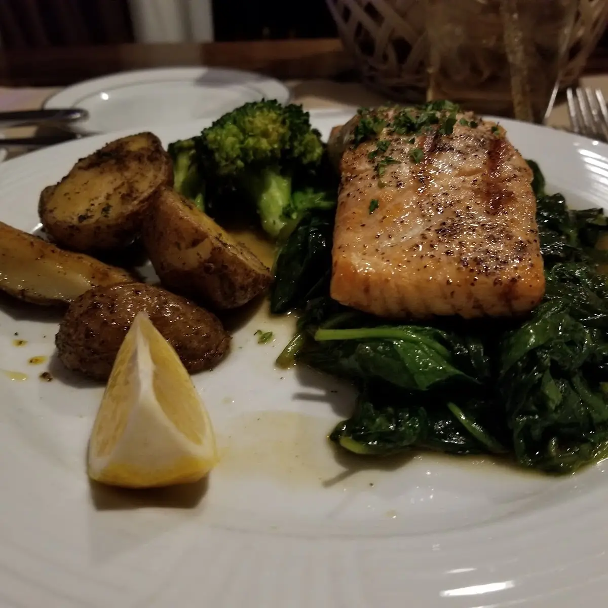 Grilled Salmon over Sauteed Spinach