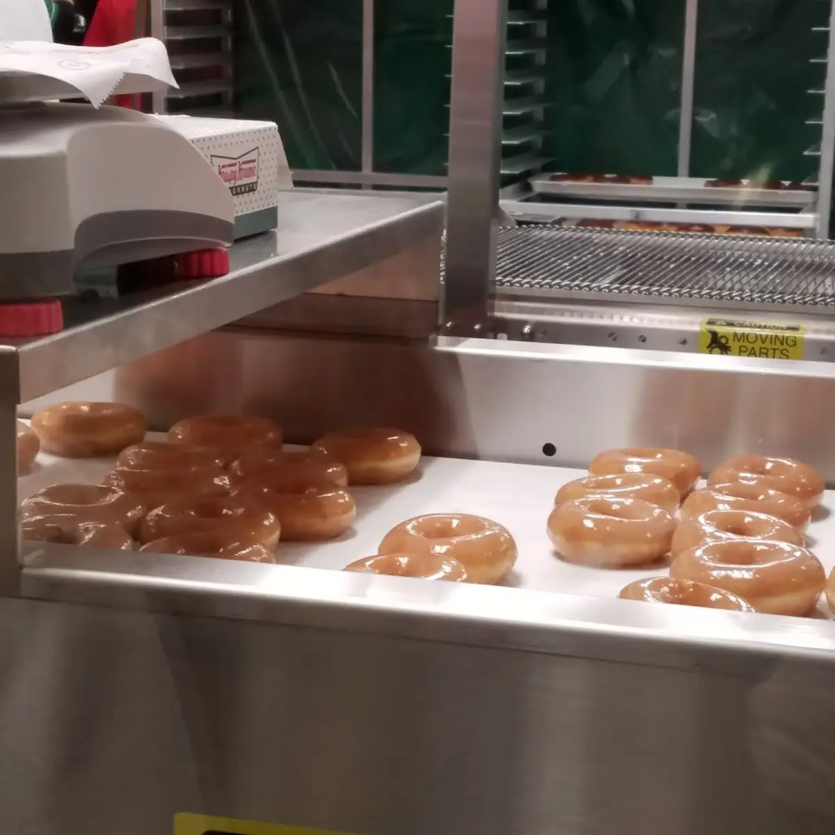 Glazed Donuts Being Made