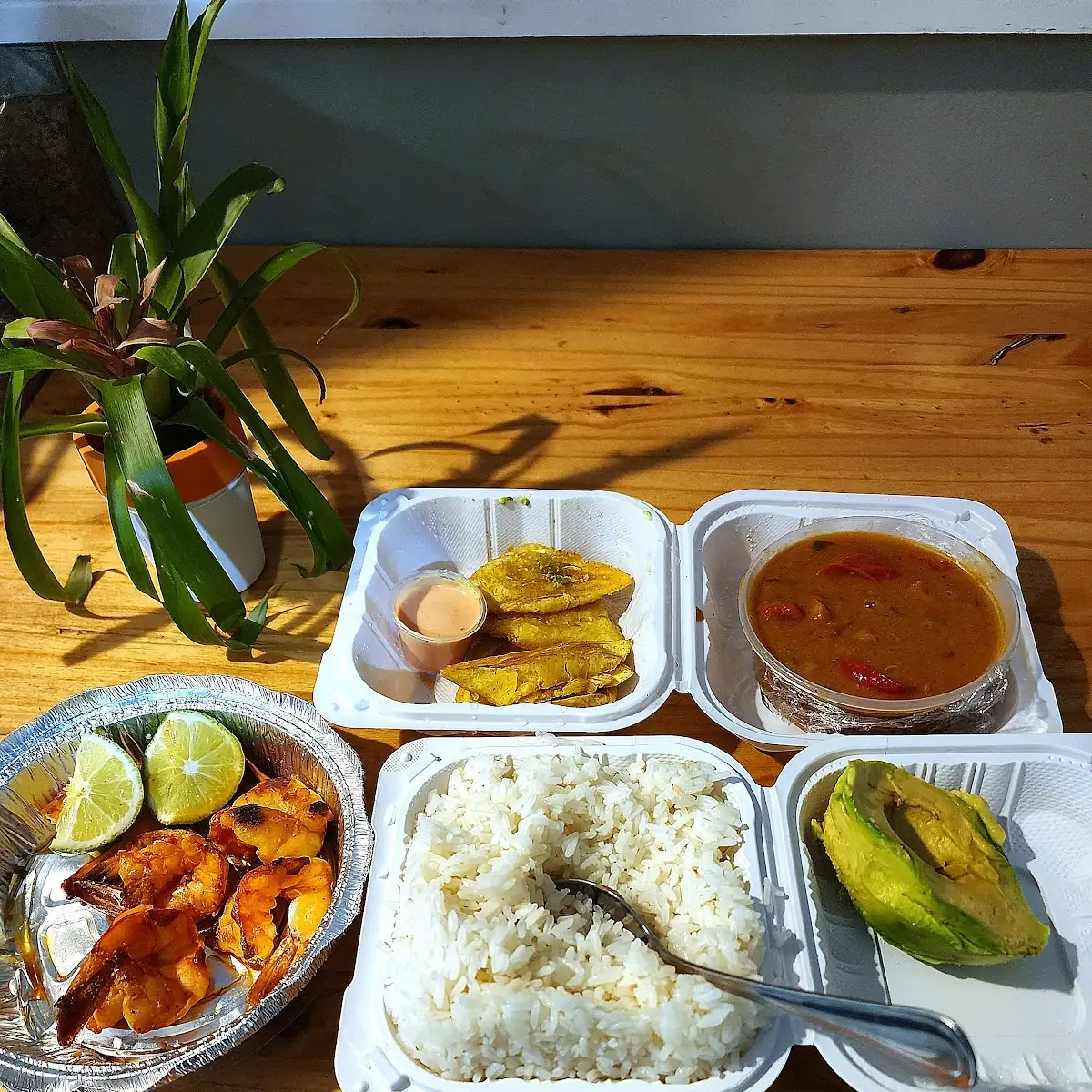 Grill Shrimp with Plantain Chips Rice Beans and Avocado