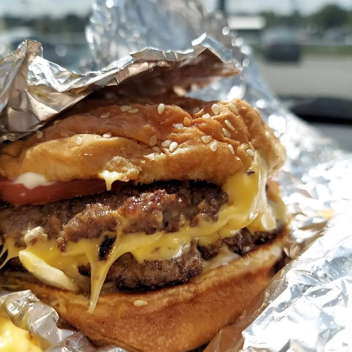 Double Cheese Burger with Grilled Onions and Tomato