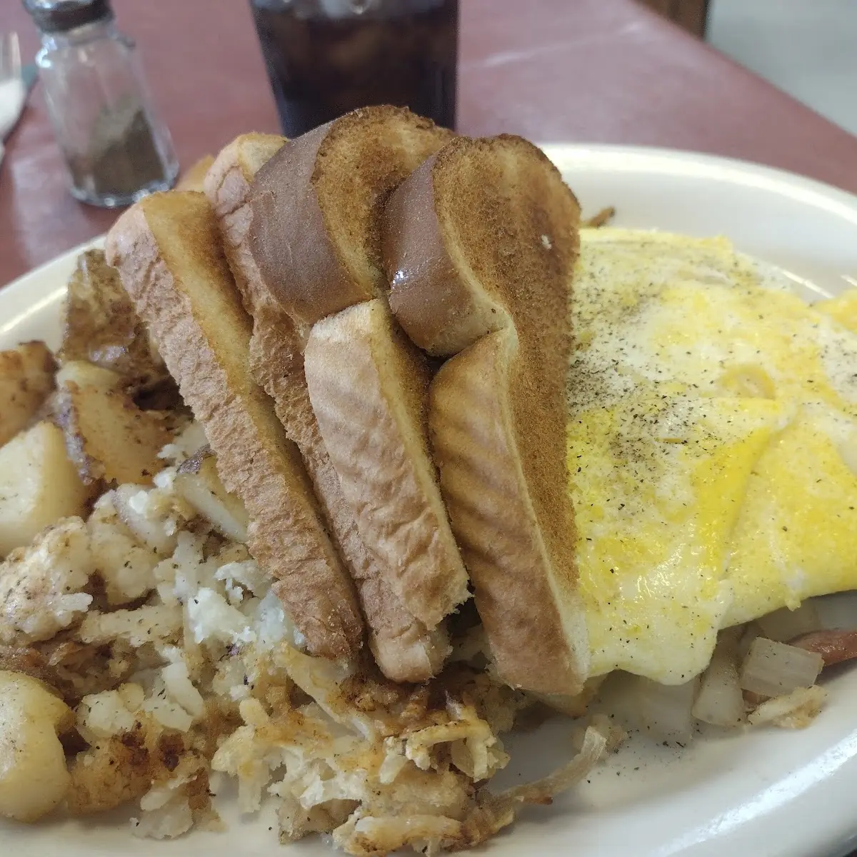 Everything Onion Omelette with Toast and Hash Browns
