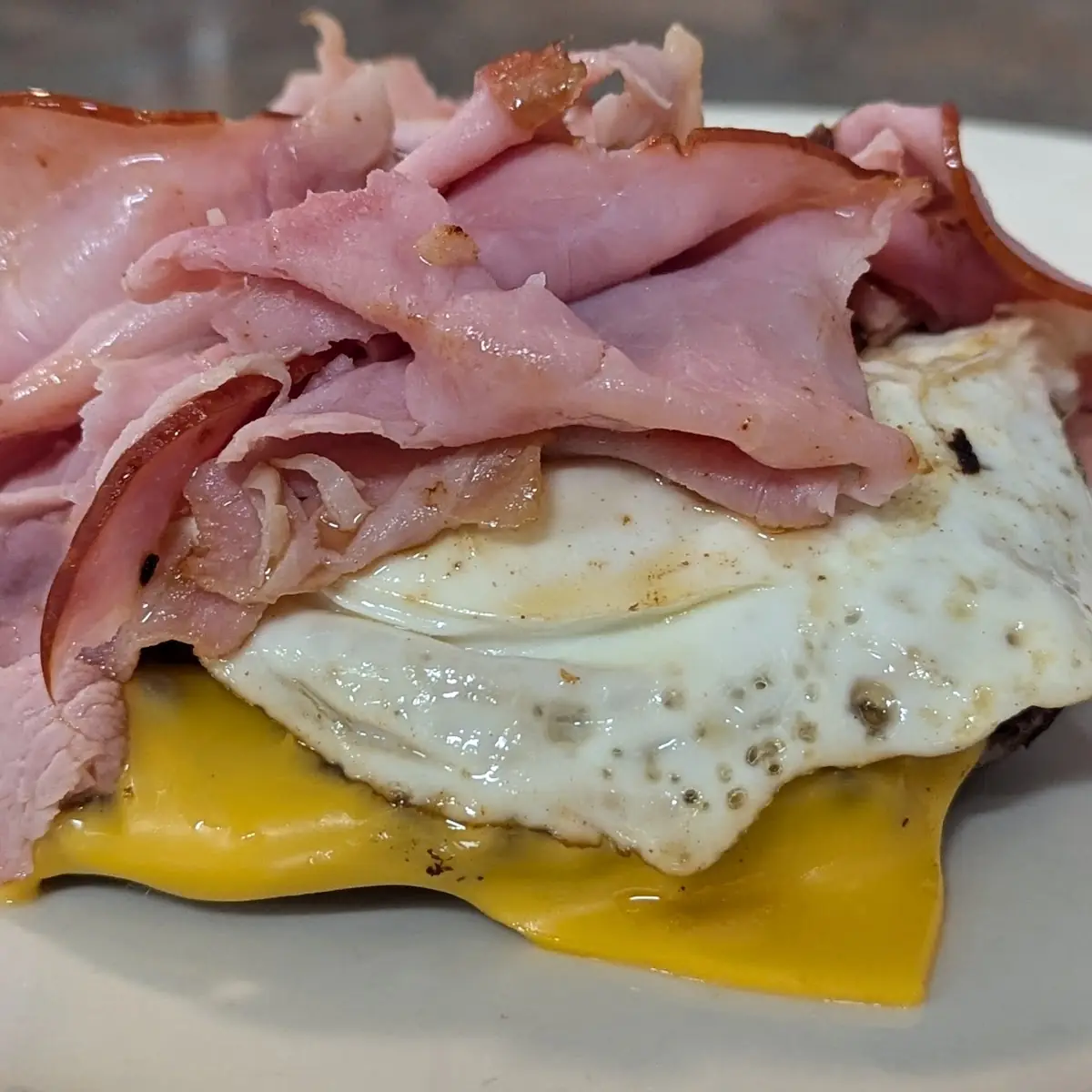 Cheese Burger with Bacon Ham and Egg