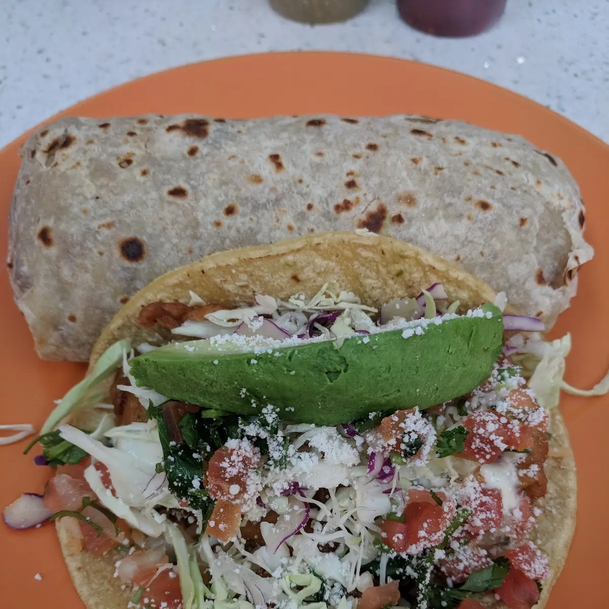 Pollo Asado Burrito and Fish Taco