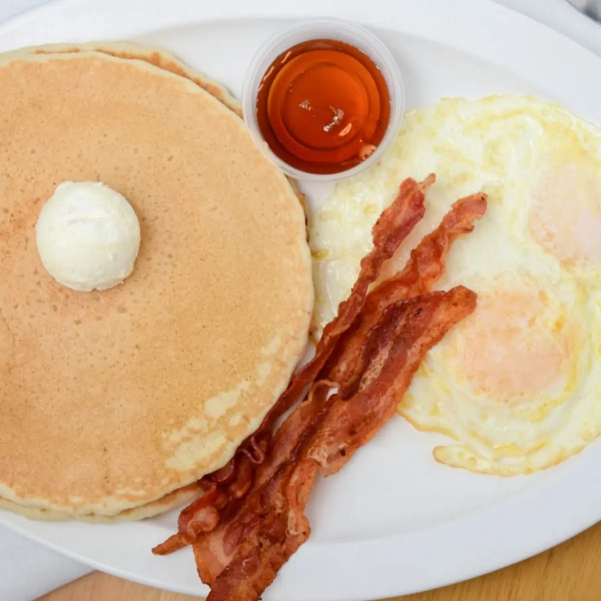 Hot Cake Short Stack w 2egg Bacon or Sausage with Two Eggs and Three Bacon or Three Sausage