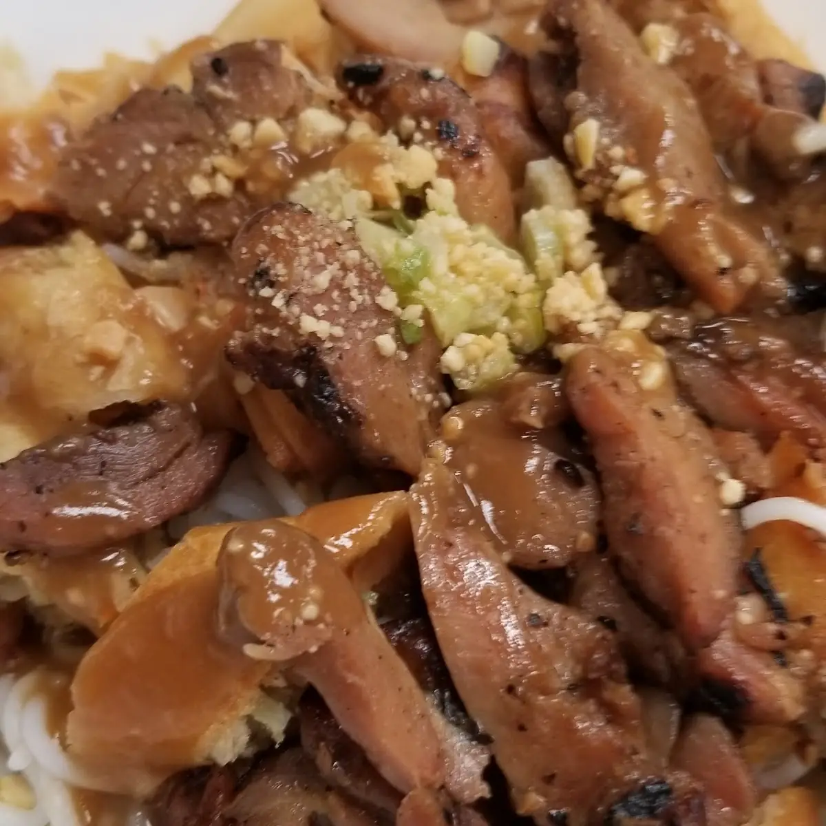 Chicken and Egg Rolls over Vermicelli