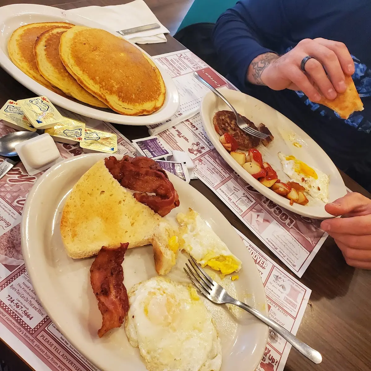 Bacon or Sausage 2 Eggs Any Style and Pancakes